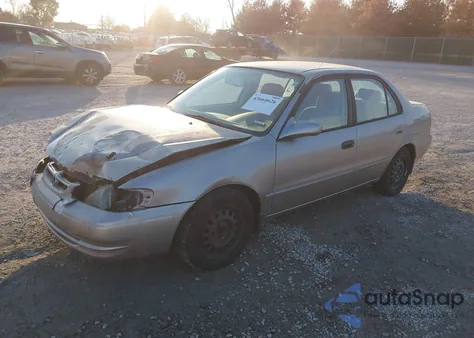 1999 Toyota Corolla Le from USA, damaged, VIN 2T1BR18E9XC119184